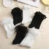 Calcetines de encaje lolita lindos para mujer, calcetines de princesa con lazo apilados, combinan con todo, calcetines blancos de encaje lolita de longitud media