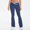 Calça de Yoga Apertada Cor da Pele Estilo Europeu e Americano com Cruz de Cor Contrastante Cintura Alta Perna Larga Flare Calças Longas Esportivas de Corrida Fitness Secagem Rápida