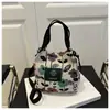 Bolso de Hombro Estilo Étnico para Mujer 2025 Moda Retro Bordado Florido Estilo Cubo Personalizado para Salir Informal Bolso Cruzado