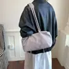 Otoño 2026 Nuevo Estilo Coreano Nicho Color Sólido Simple Ligero Bolso Tote Casual Gran Capacidad Bolso de Hombro Único para Viajar