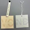 Etiqueta de Ropa de Papel Especial de PVC Personalización Etiqueta en Relieve Cóncava y Convexa Fábrica de Etiquetas de Ropa Personalizadas Personalización de Etiqueta Colgante