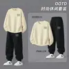 Traje casual de dos piezas para hombre transfronterizo estilo Hong Kong, con estampado de letras simple, moderno y elegante, cuello redondo, versátil, corte holgado