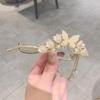 Estilo antigo lírio flor borla pérola torção clipe Hanfu elegante palavra de fada sapo fivela traseira cabeça clipe primavera