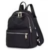 Mochila pequeña de tela Oxford para viaje de moda para mujer 2026, bolsa de lona versátil y elegante, bolso de hombro y mochila