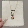 Colar com Pingente de Flor Colorida de Strass para o Ano Novo para Mulheres, Popular no Xiaohongshu, Corrente Clavicular de Nicho de Luxo Leve com um Toque de Alto Padrão