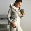 2025 Moda Europeia e Americana Outono e Inverno Amazon Venda Quente Tecido Fleece Moda Carimbo de Couro Manga Longa com Capuz Casual Conjunto Esportivo