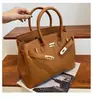 Estilo explosivo de moda transfronteiriça bolsa grande de mão feminina 2026 nova bolsa vermelha de casamento da moda bolsa tote transversal de grande capacidade