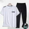 [Conjunto de Seda de Gelo] Camiseta Esportiva Masculina de Manga Curta de Secagem Rápida para o Verão, Calça Versátil de Seda de Gelo para Jovens, Top Solto de Meia-Manga
