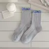Calcetines de media pantorrilla para mujer, primavera y otoño, con volantes y puños de canalé doble, estilo preppy, dulce japonés, calcetines de algodón holgados, transpirables, versátiles