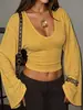 Ropa Femenina Transfronteriza Europea y Americana Otoño/Invierno 2026: Top Picante de Chica con Escote en V Profundo, Texturizado, Acampanado, Manga Larga y Cintura Corta Ceñida