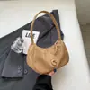 Bolsa de Ombro para Mulheres 2025 Inverno Nova Bolsa de Axila Cor Sólida Bolsa Bolinho Estilo Estrangeiro Bolsa Popular Deste Ano Bolsa Feminina