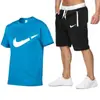 Traje de Verano Europeo y Americano para Hombres y Mujeres Camiseta de Algodón Pantalones con Cremallera Conjunto Casual Deportivo de Dos Piezas
