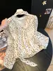 Camisa feminina luxuosa e sofisticada 2026 início do outono blusa de gola V com laço única e bonita estilo francês top jovem e estiloso