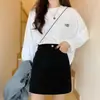 Falda Larga de Pana Invierno 2026 Nueva Cintura Alta Cadera Envuelta Persona Baja Falda Negra Pequeña Mujer Falda Corta de Terciopelo Primavera Otoño