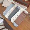 Temporada de primavera y otoño, calcetines a rayas con lazo, estilo coreano dulce y preppy, calcetines de algodón puro hasta la mitad de la pantorrilla, calcetines de mujer sin costuras