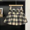 Falda Corta de Lana a Cuadros para Mujer 2025 Otoño e Invierno Nueva Cintura Alta con Cinturón Falda Plisada Retro de Corte A Falda Engrosada