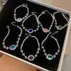 Pulsera Colgante Ovalado Flor de Circonita Cúbica Estilo Coreano Lujo Ligero Sensación de Alta Gama Anillo de Mano Moda Exquisito Versátil Joyería de Mano Venta al por Mayor
