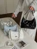 Bolsa de Ombro com Corrente Rombos Design de Nicho para Mulheres Verão 2026 Nova Moda Simples para o Dia a Dia Transversal de Ombro para Mulheres