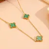 Moda transfronteriza acero inoxidable flor de tres cuatro hojas joyería Europa y Estados Unidos nuevo acero de titanio no se decolora traje de joyería de flor pequeña