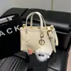 Bolsos Multicolores Transfronterizos para Mujer 2025 Nuevos de Moda Bolsos Pequeños de Gama Alta Bolsos Pequeños Cruzados de Verano Bolsos Cubo Populares