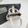 Bolso Texturizado para Axila 2025 Primavera Nuevo Bolso de Mujer Moda Distintiva Bolso de Mano con Perlas Bolso de Hombro Retro de Gran Capacidad
