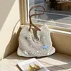 Bolso Grande de Mujer 2026 Nuevo Estilo de Nicho Hombro Único Vacaciones en la Playa Tejido de Paja Bolso Tote para el Trabajo