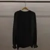 Nueva camiseta blanca de manga larga para mujer 2026, versátil, holgada, casual, de longitud media, hecha de terciopelo alemán, adecuada para combinar con pantalones de tiburón