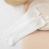 Calcetines apilados para niños, otoño e invierno, nuevos calcetines de tubo medio con perlas de un solo color, calcetines de princesa con lazo y perlas.