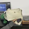 Bolsa Feminina 2025 Outono Nova Moda Bolsa de Tecido Cor Sólida Tendência Bolsa de Ombro Casual Transversal Pequena para o Dia a Dia