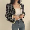 Chaqueta corta de cuadros estilo Chanel en stock