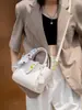 Bolso Cesta de Moda de Este Año 2025 Nuevo Bolso Cubo de Cuero Genuino Bolso de Mano Cruzado para Mujer de Verano