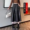 Falda de cuero negro, de longitud larga, para mujeres petite, nuevo modelo otoño 2026, falda de línea A de cintura alta, media falda de cuero PU