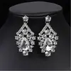 Pendientes de botón para mujer estilo retro europeo explosivo de moda, de alta gama, con incrustaciones de diamantes, de cristal de colores mixtos, joyería