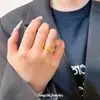 Item popular no Xiaohongshu: Anel de contas Ruyi dourado-areia, o mesmo estilo das joalherias, uma joia que carrega o artesanato tradicional, um anel ajustável