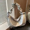 Bolso de mano de diseño nicho transfronterizo 2026 nuevo primavera-verano versión coreana de gran capacidad bandolera para estudiantes