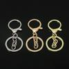 Llavero colgante cadena de anillas accesorios de joyería DIY fábrica 308 broche de langosta juego de tres piezas cadena de cuatro secciones de 8 palabras chapado con retención de color