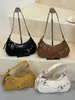 Bolsa de ombro feminina de nicho transfronteiriça estilo vintage moderna, bolsa de ombro texturizada versátil para o verão, estilo bolinho
