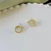 Aretes de Piedra Ojo de Gato Aretes Giratorios para Mujer Verano Nuevo Temperamento Personalizado Diseño de Nicho Sentido Joyería Giratoria para Orejas