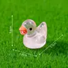 Miniaturas adoráveis e brilhantes de patinhos amarelos - perfeitas para decorações DIY e como pequenos enfeites de mesa