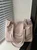 Bolsas Femininas Atacado Primavera 2026 Novo Versátil Estilo Executivo Corrente de Pérola Texturizada Grande Capacidade Casual Bolsa de Ombro Tote