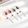 TikTok Live Elegantes Aretes Azules Rojos de Cristal con Borla Larga de Pavo Real Fénix Aretes al por Mayor para el Cabello
