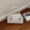 Bolso de lunares de nicho transfronterizo para mujer, nuevo bolso cruzado popular y versátil 2026, bolso de mano, bolso tipo almohada al por mayor