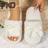 Pantuflas de algodón peluche con lazo, nuevo estilo para interior y exterior, tamaño pequeño, en stock, pantuflas cómodas y esponjosas