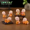 Paisagem miniatura criativa travessa quatro-não mongezinho Zen acessórios decorativos, pequena estatueta de monge para carro, desktop ou mesa de chá