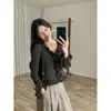 Suéter de punto ajustado con volantes de diseño coreano, nuevo y versátil suéter de punto con cuello en V que estiliza la cintura para mujer, otoño 2026