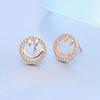 Versión coreana de arete de plata s925 versátil, lindo, súper lindo, cara sonriente, personalidad femenina, temperamento simple, fabricantes de aretes, generación en vivo