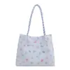 Bolso tipo cubo estampado dulce modelo nuevo 2026, gran capacidad, bolso de hombro moderno y versátil, bolso de alta gama para el día a día, bolso tote para mujer