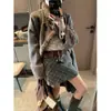 Falda Corta de Lana a Cuadros Retro Coreana Moqie Gaohui Ouni de Cintura Alta Adelgazante Línea A con Cinturón Mq1022