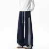 Pantalones casuales a rayas de bloques de color estilo retro americano para hombre, pants holgados de pierna ancha, pantalones deportivos rectos para adolescentes, azul marino
