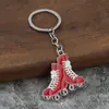 Chaveiro de patins laranja direto da fábrica transfronteiriço liga de zinco personalidade da moda chaveiro de patins por atacado